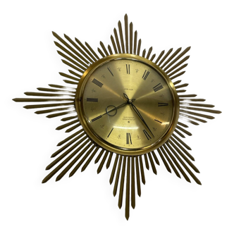 Vintage sunburst clock gold-colored Junghans design from the 1970s