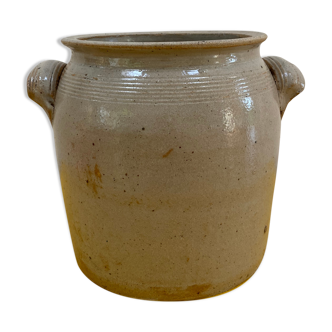 Old grease pot in gray sandstone of the charentes