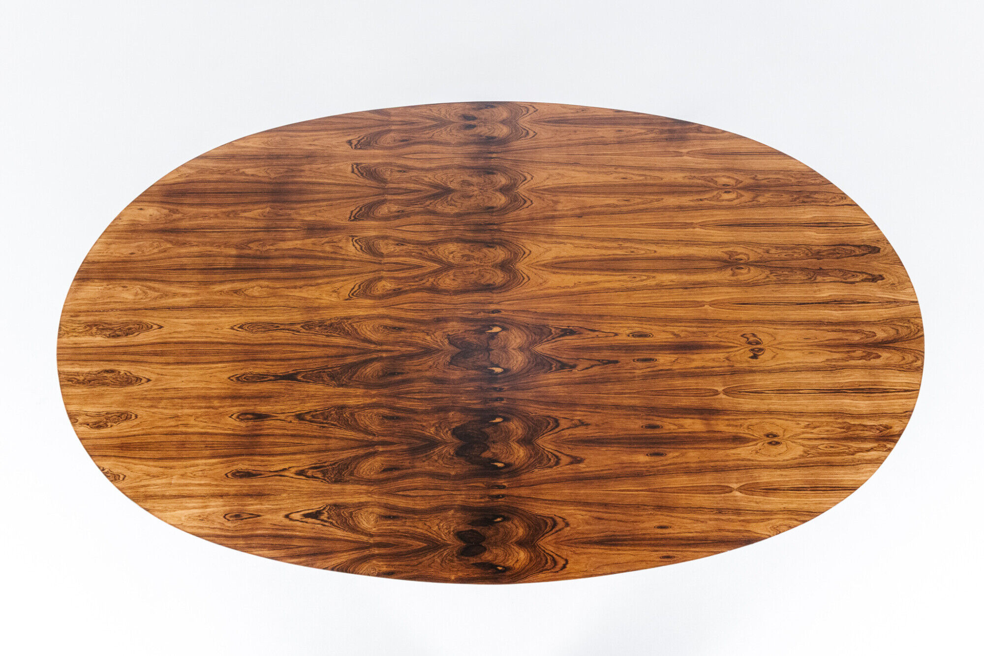 Oval dining table in rosewood by Maurice Burke for Arkana, England, 1960s