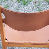 Pair of brutalist chairs in elm and stretched leather with saddle stitching Self publisher