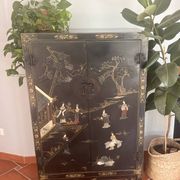 Magnificent black and gold lacquered Chinese cabinet.