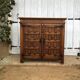 Spanish furniture with carved wood profiles and coats of arms from the 1950s.