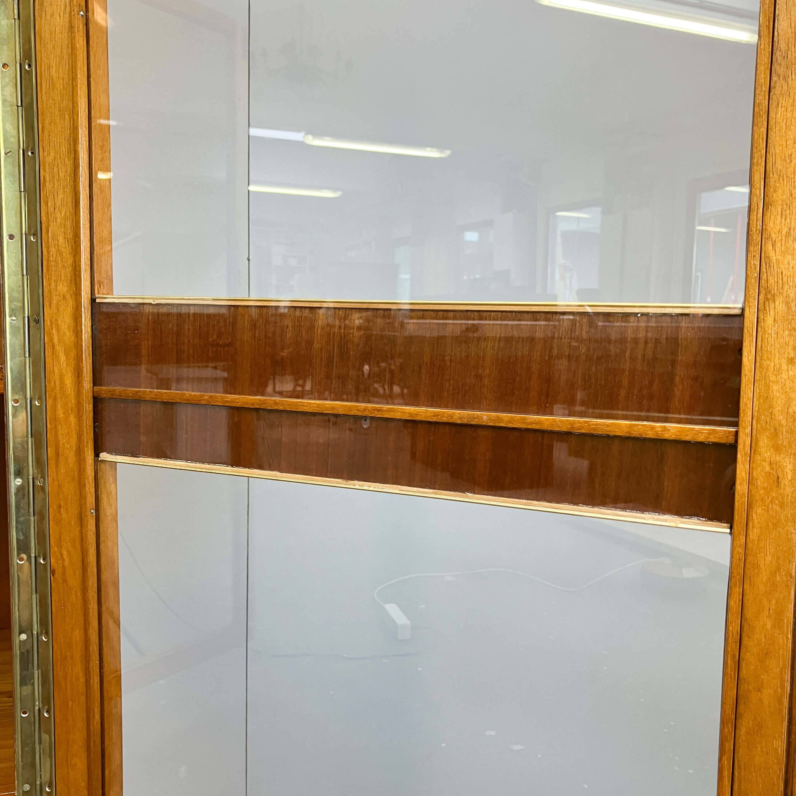 Art Deco cabinet with glass doors, various woods, 1930s