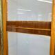 Art Deco cabinet with glass doors, various woods, 1930s