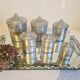 Aluminum and brass spice jars