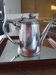 Antique Christofle silver-plated coffee pot with monogram.
