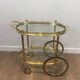 Oval brass trolley from Maison Baguès.