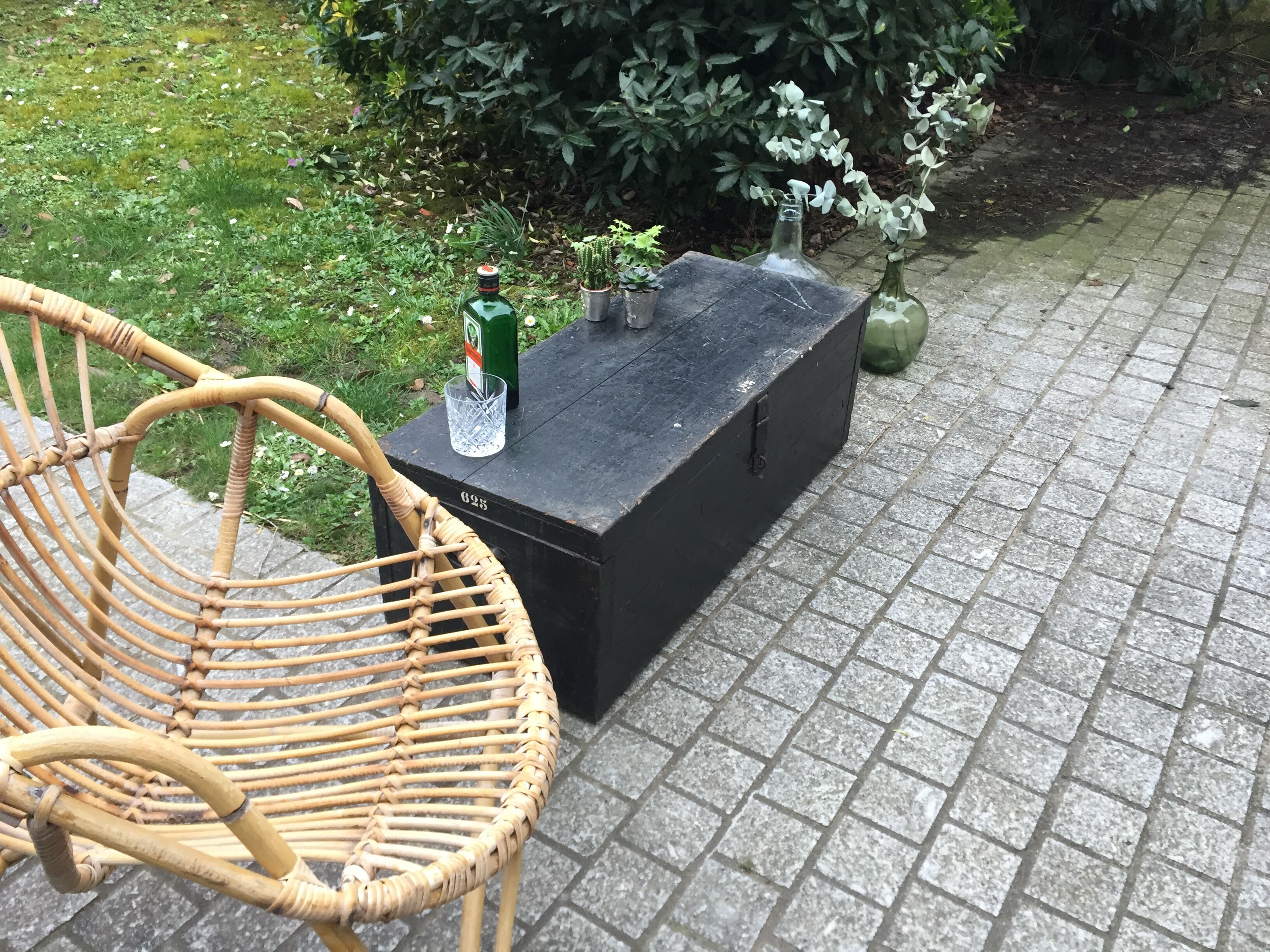 Old chest or wooden trunk black patina
