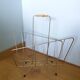 Gold metal magazine rack