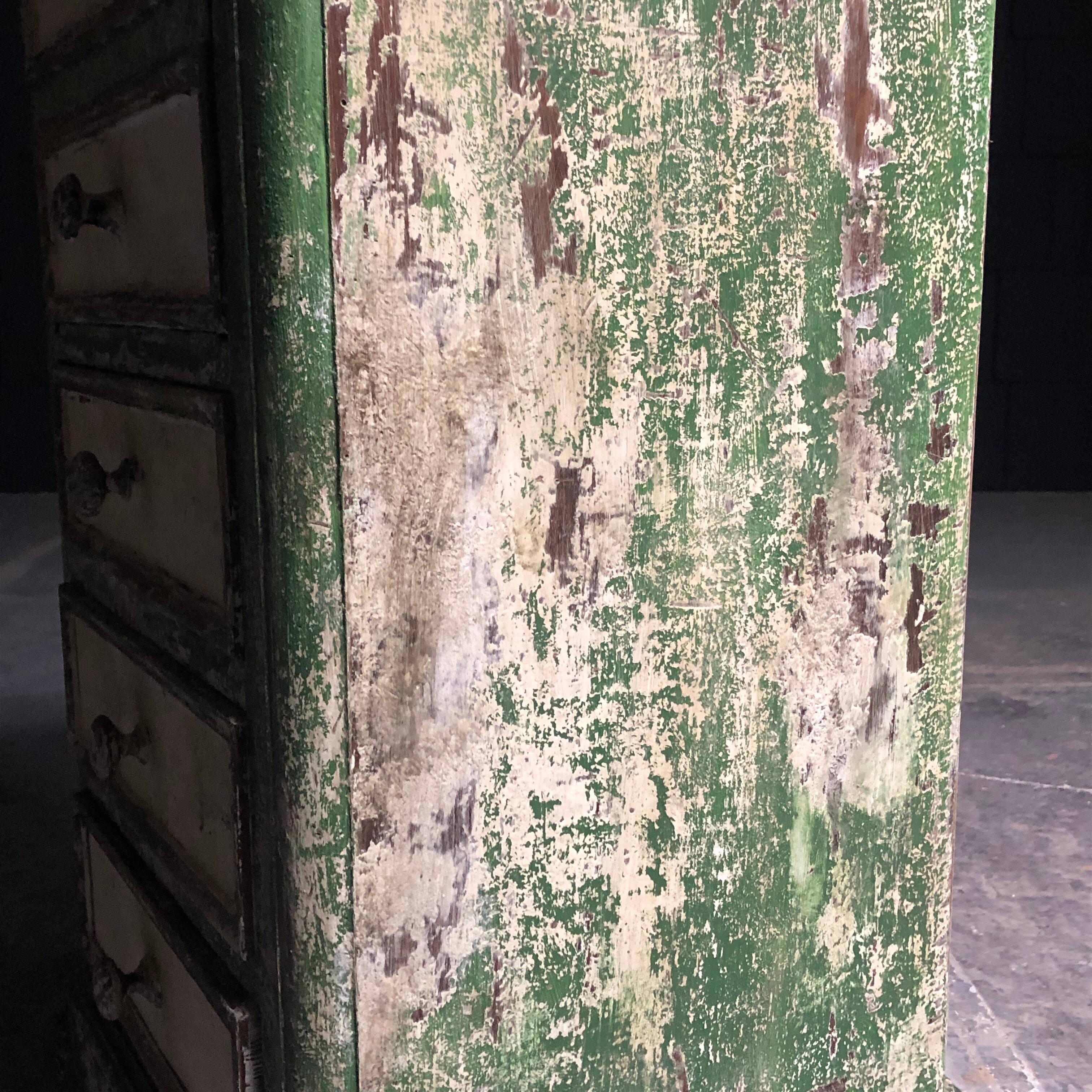 Old wooden dresser, aged green patina