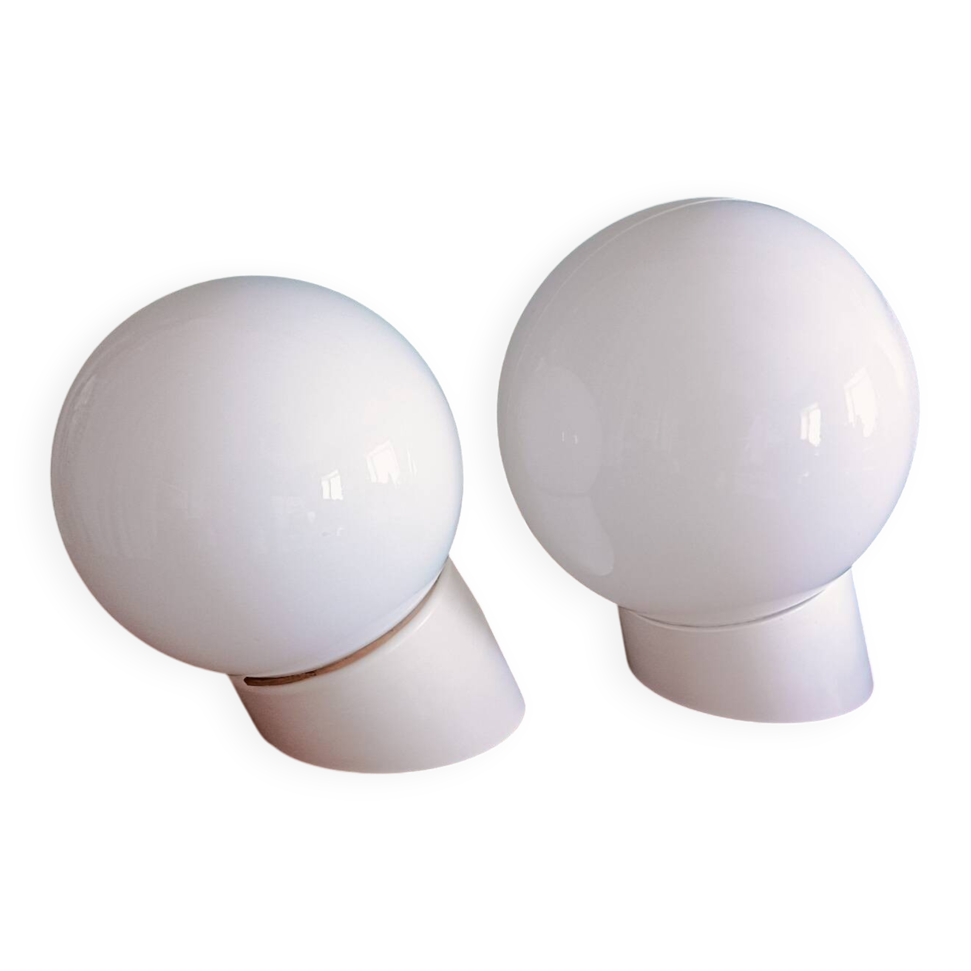 Two opaline glass globe wall lights