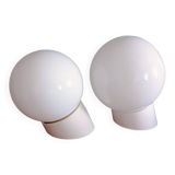Two opaline glass globe wall lights