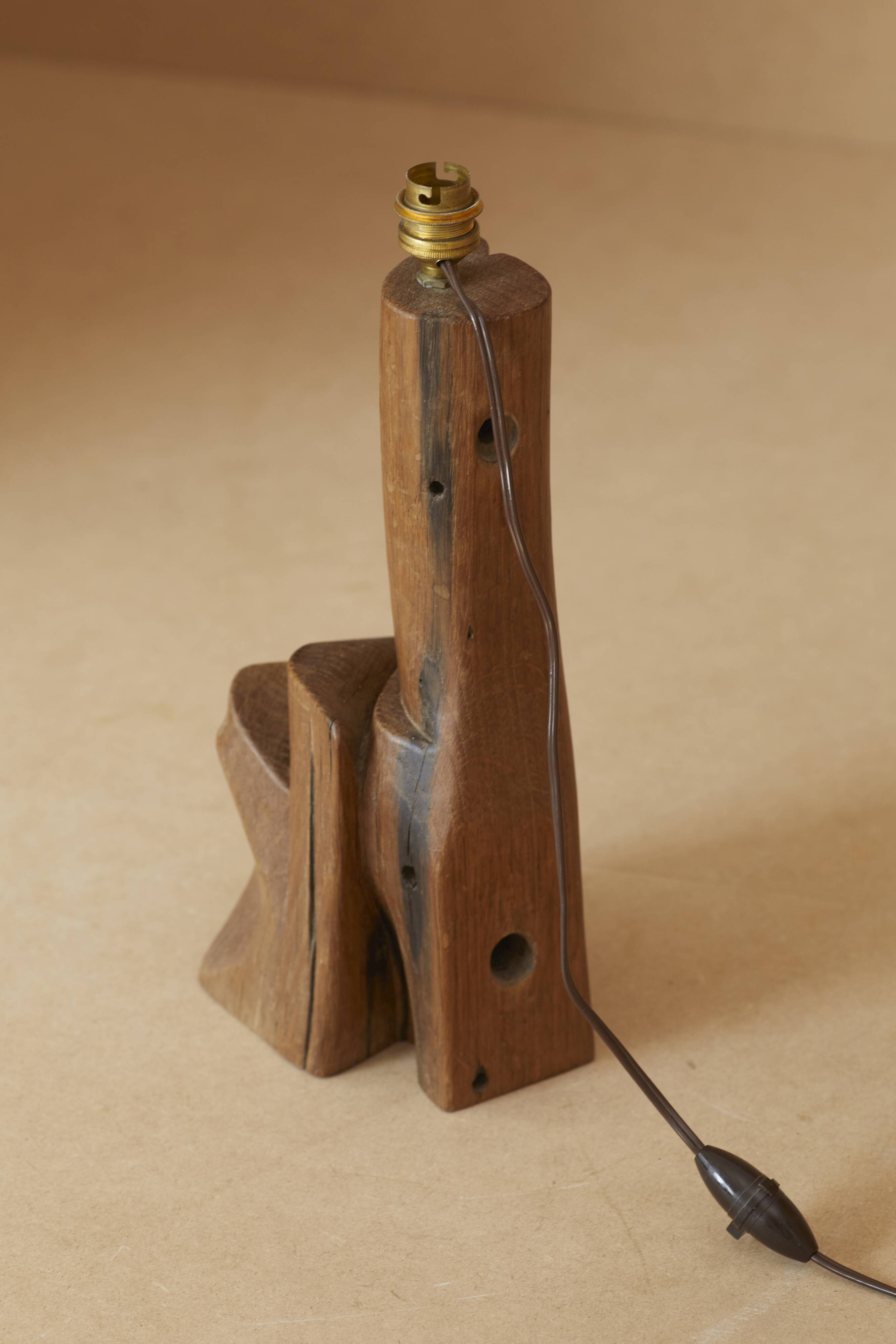 Sculptural lamp in solid wood circa 1960