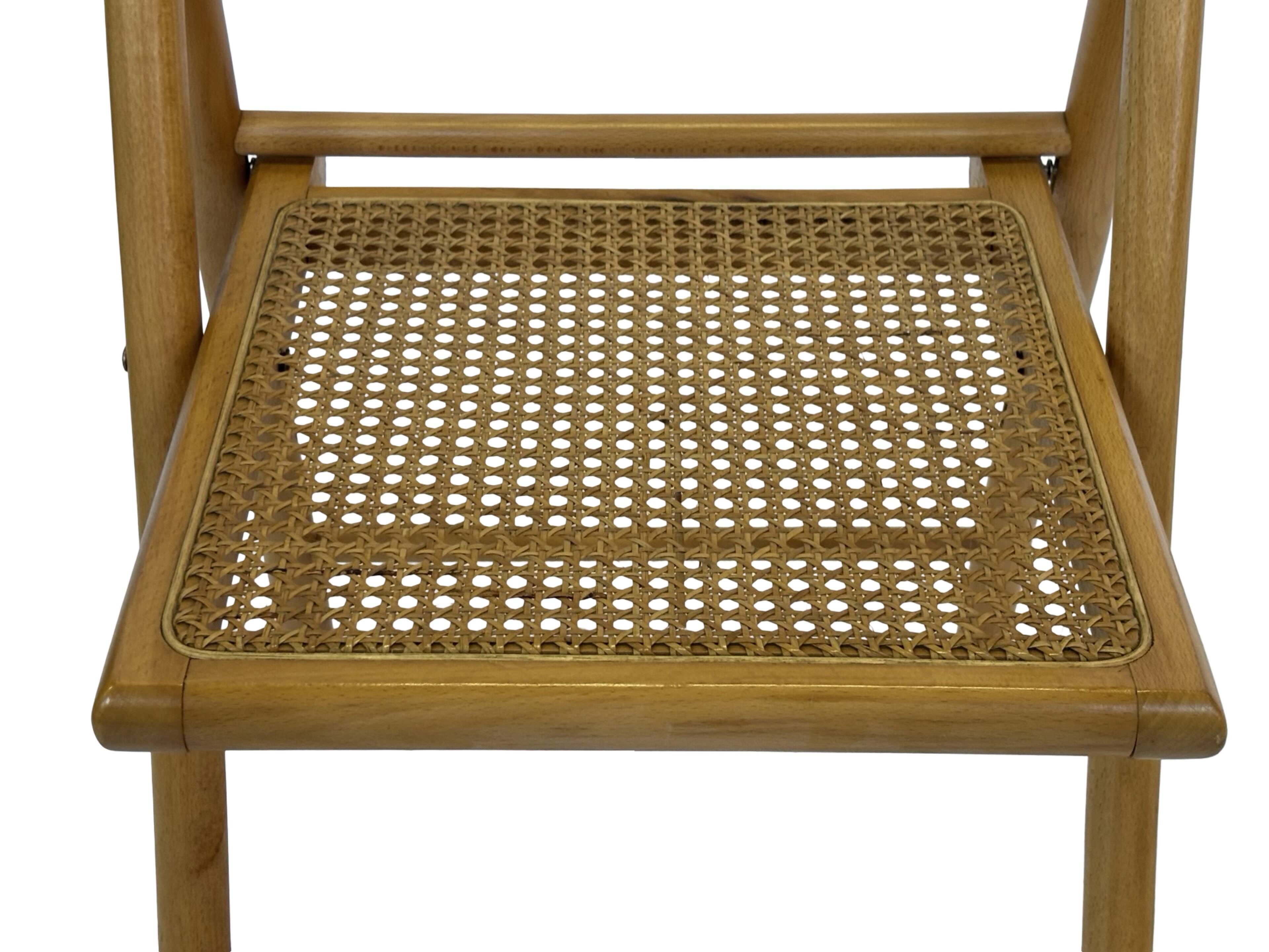 Vintage wooden folding chair with rattan seat 80s minimalist design