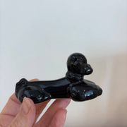 Box of 12 dog-shaped cutlery rests in yellow and black majolica.