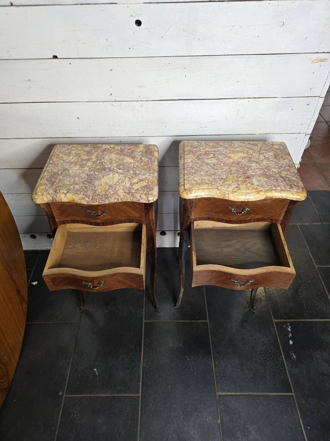 Pair of Louis XV style curved bedside tables in marquetry