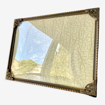 Metal frame in gold colored brass