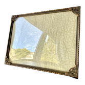 Metal frame in gold colored brass