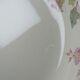 Antique Longchamp service shallow dish with polychrome daisies, ironstone, 19th century.