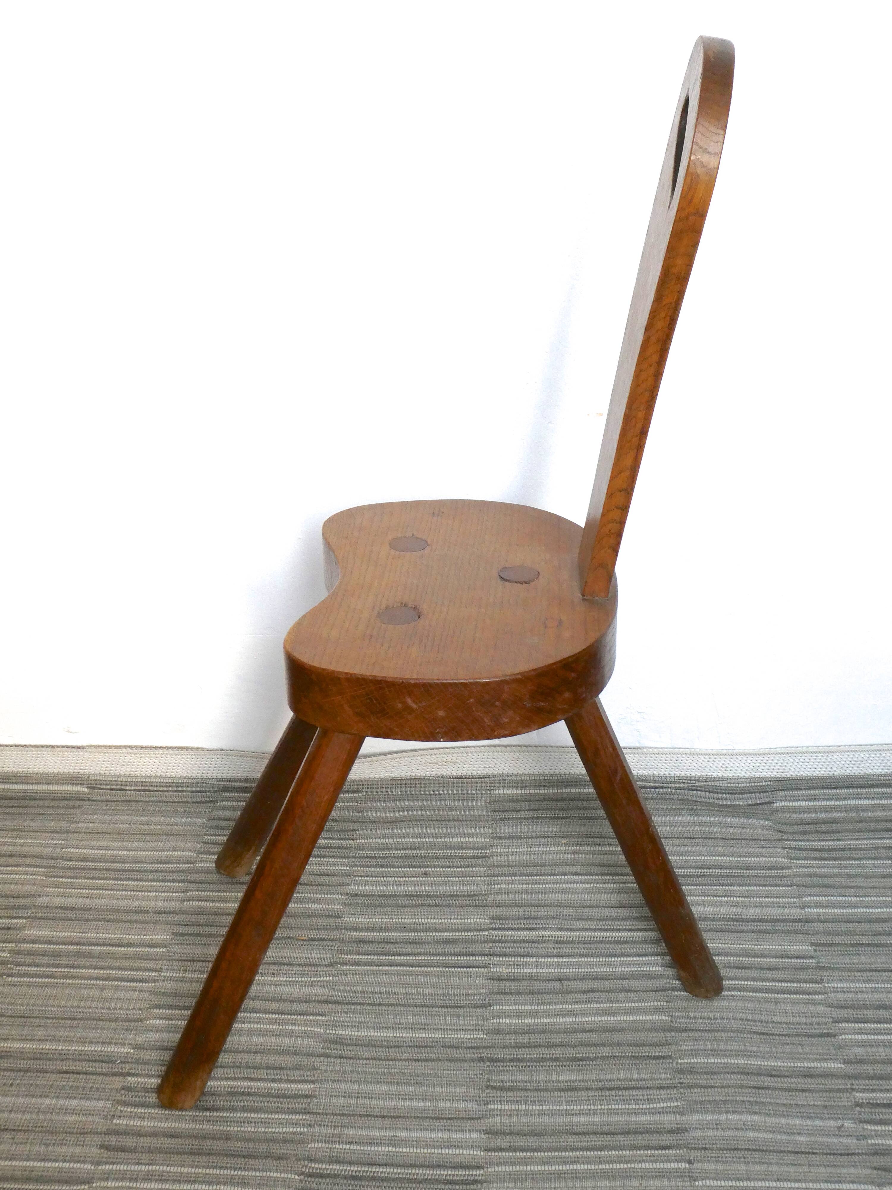 Massive, brutalist wooden tripod Chair