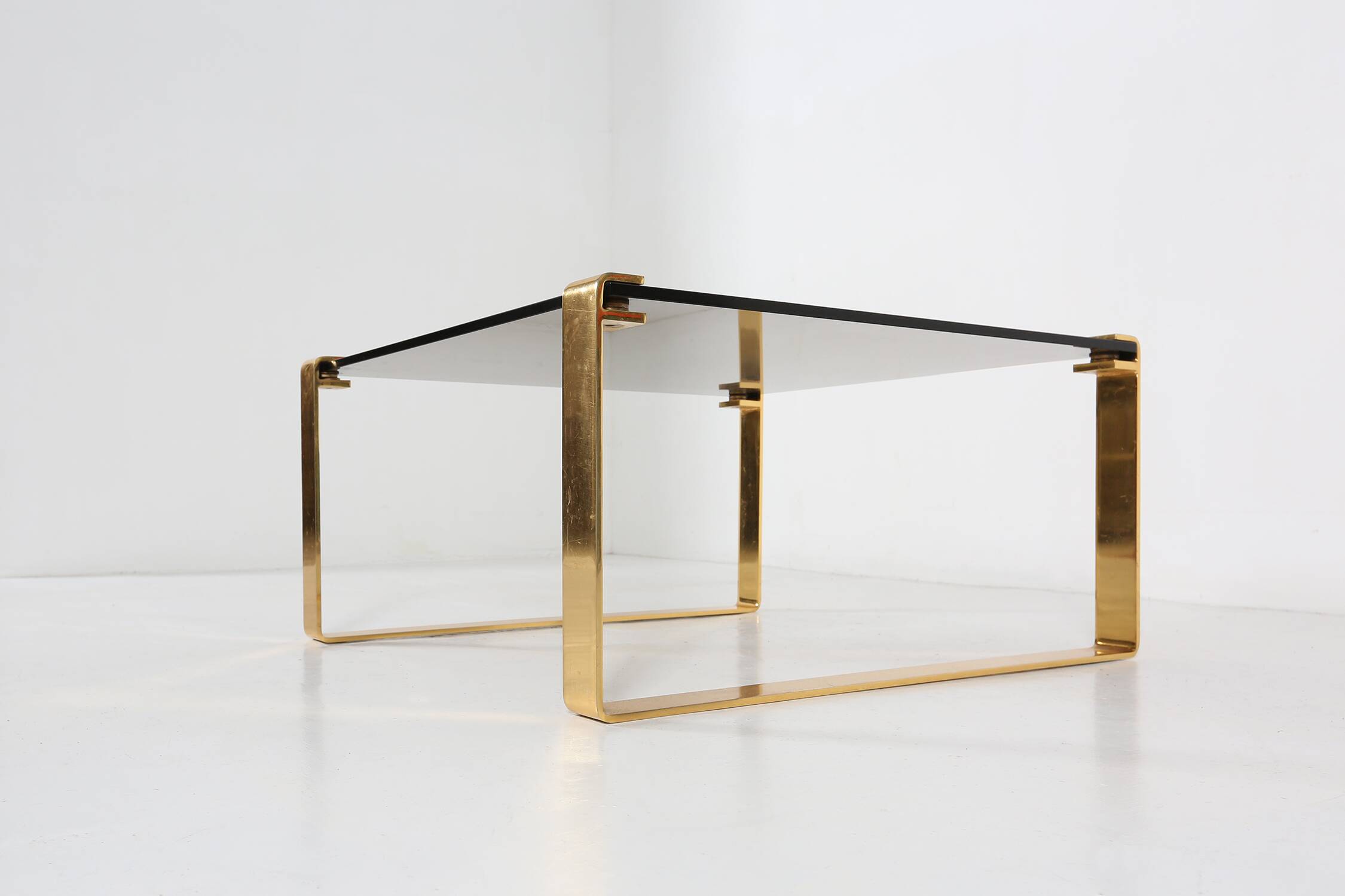 Mid-century coffee table with gold plated base and glass top, 1970s