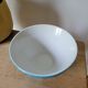Opaque blue porcelain bowl