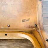 Baumann chair stamped in red skai