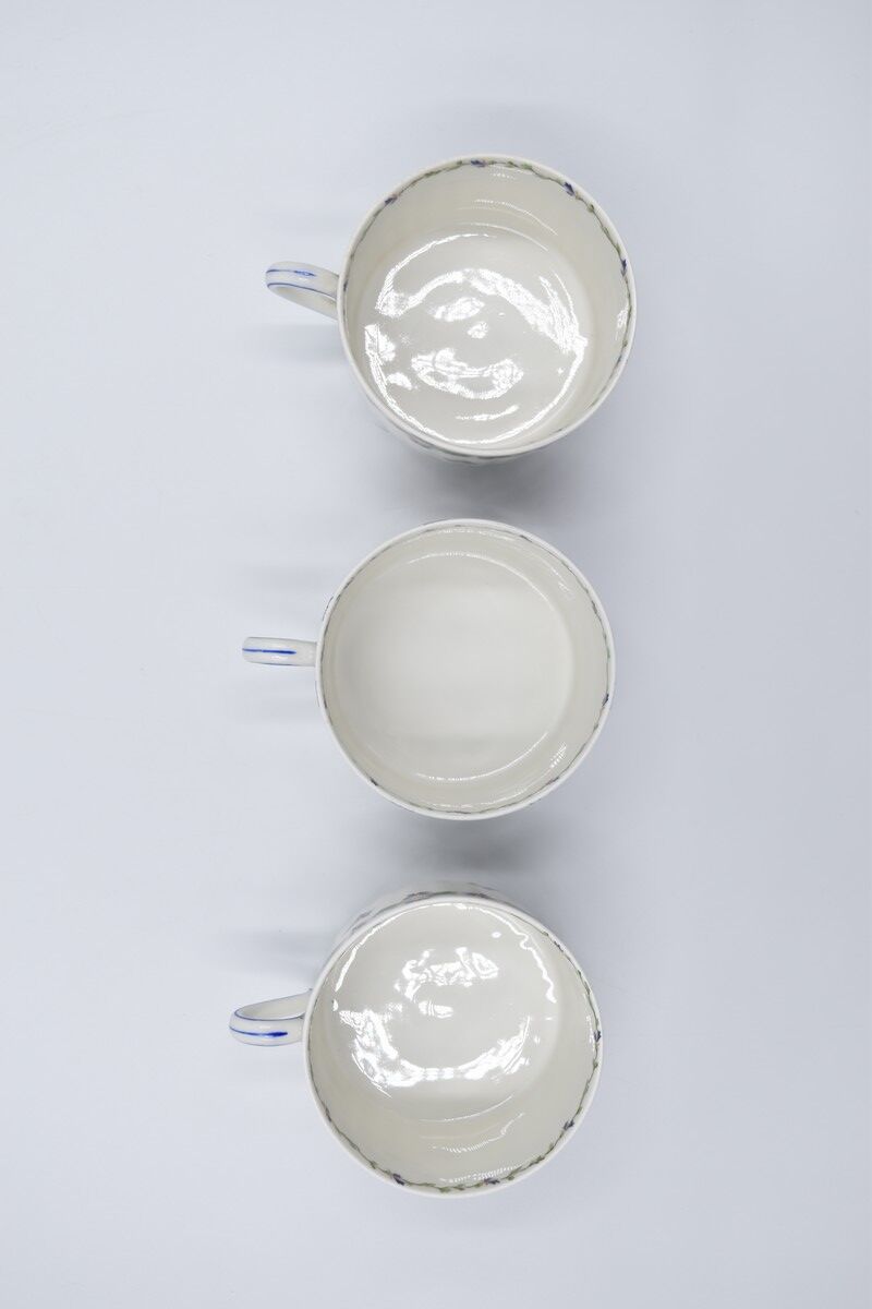 Three cups and under porcelain tea cups from Limoges Haviland barbed-wire décor
