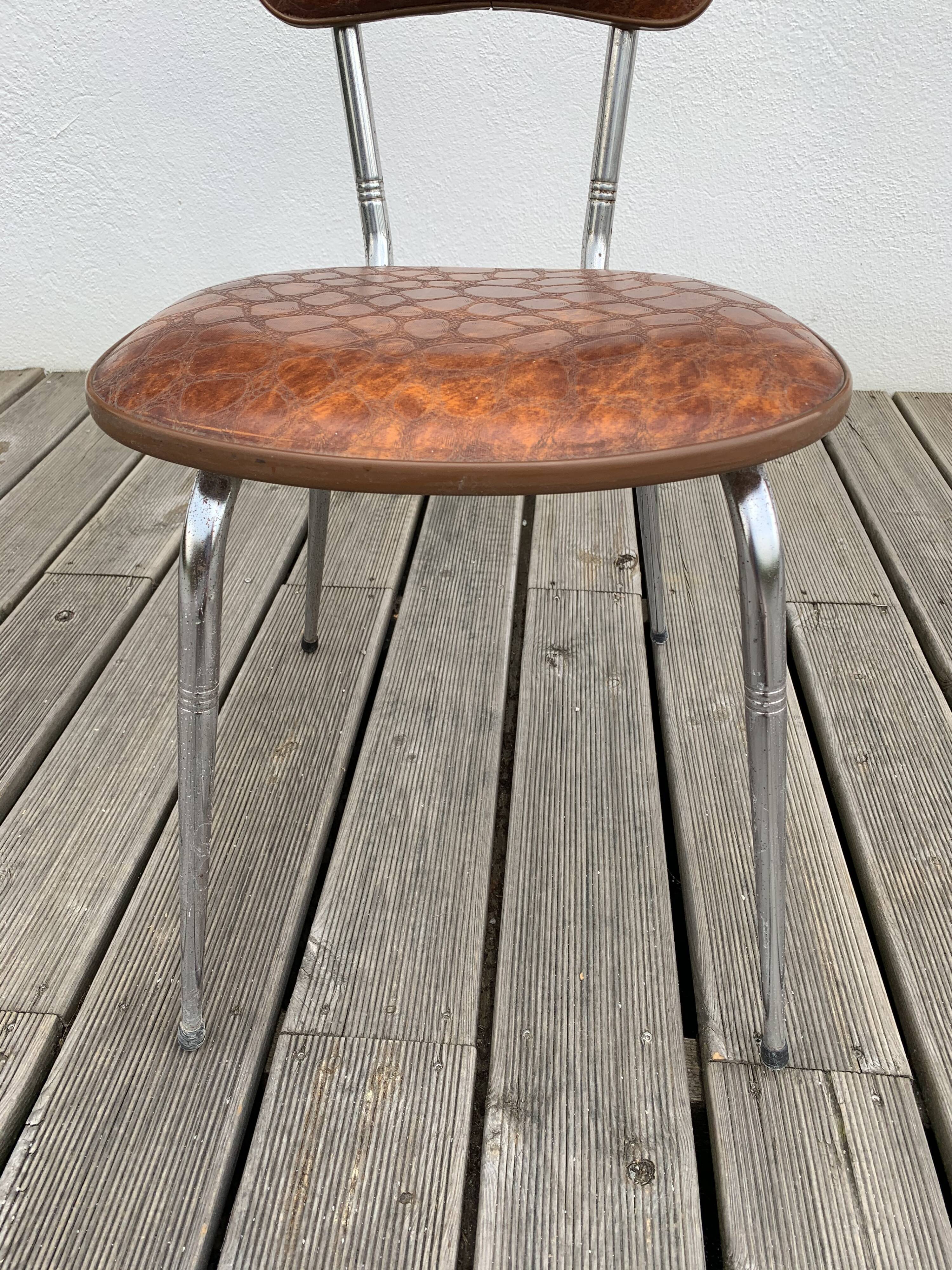 Brown skai chairs and stool
