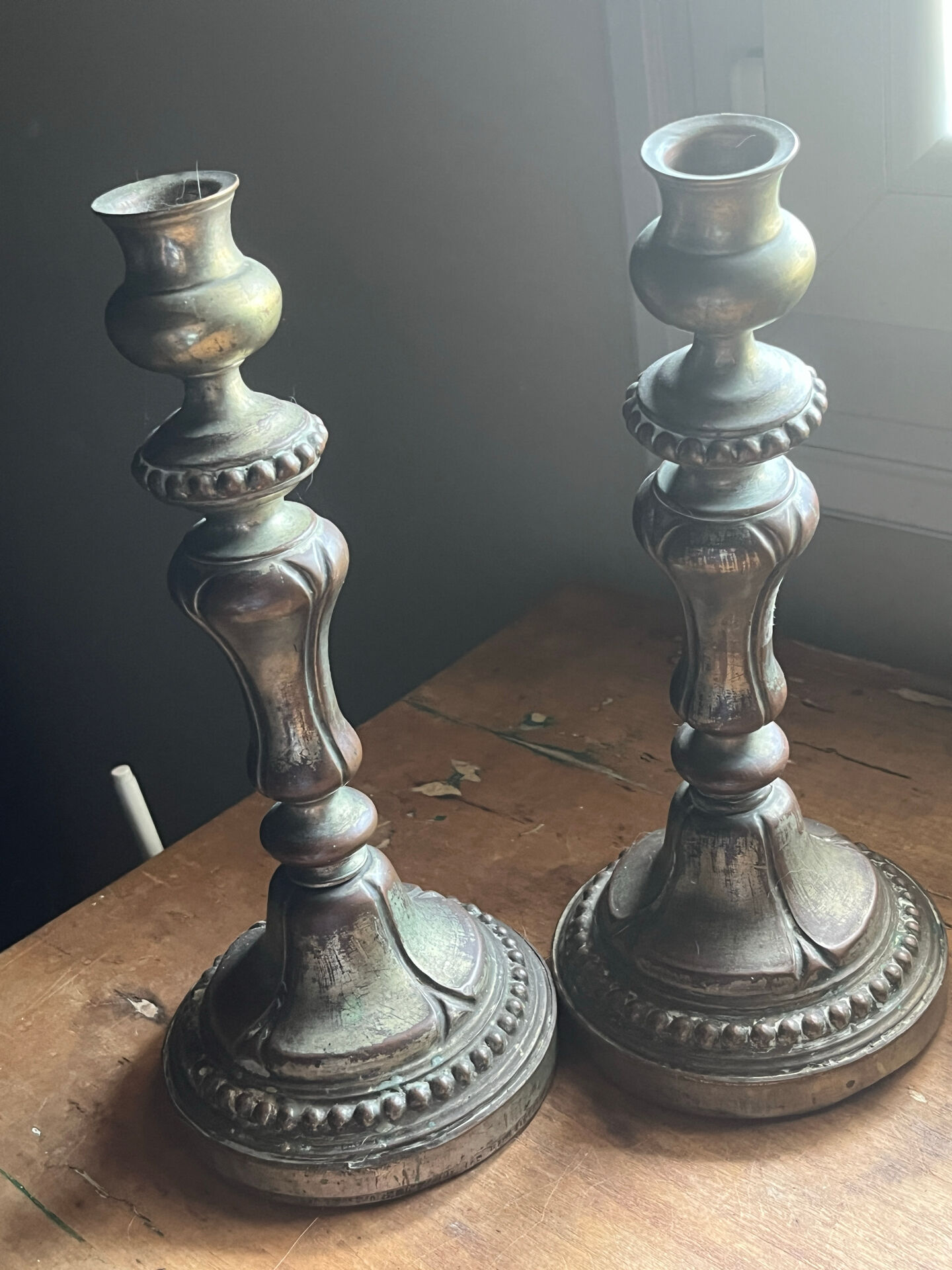 2 antique silver candlesticks