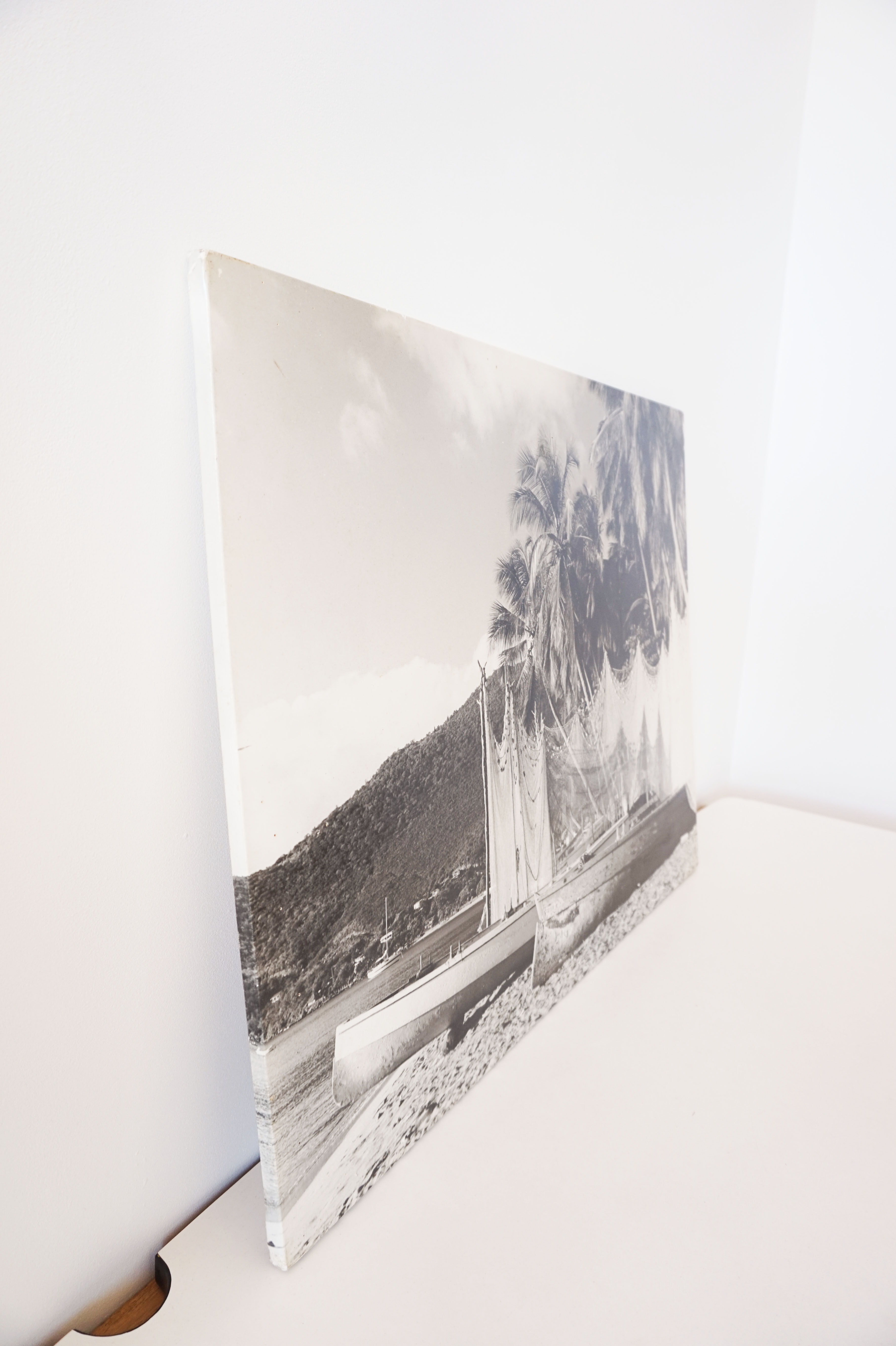 Old photograph on wood panel