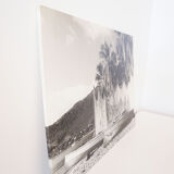 Old photograph on wood panel