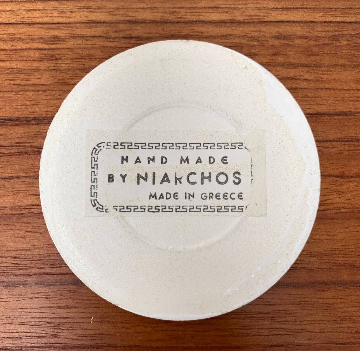 Set of 13 vintage ceramic coasters handmade by Lito Niarchos.