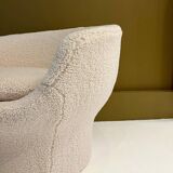 Round armchair in the style of Paulin