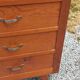 Vintage 1950s chest of drawers with tapered legs and 5 drawers.