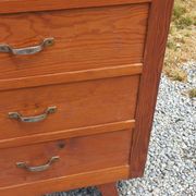 Vintage 1950s chest of drawers with tapered legs and 5 drawers.