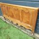antique headboard in cherry wood