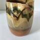 Glazed earthenware jug