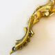 A pair of rococo gilded wall lights