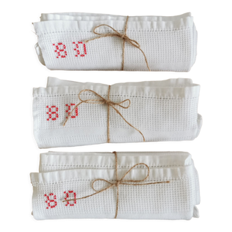 Old honeycomb tea towels embroidered