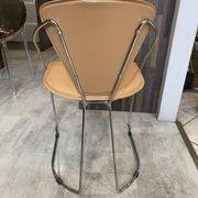 1 Linda armchair chair by Arrben in camel brown leather with a chrome steel frame.