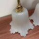 Pair of white tulip wall sconces