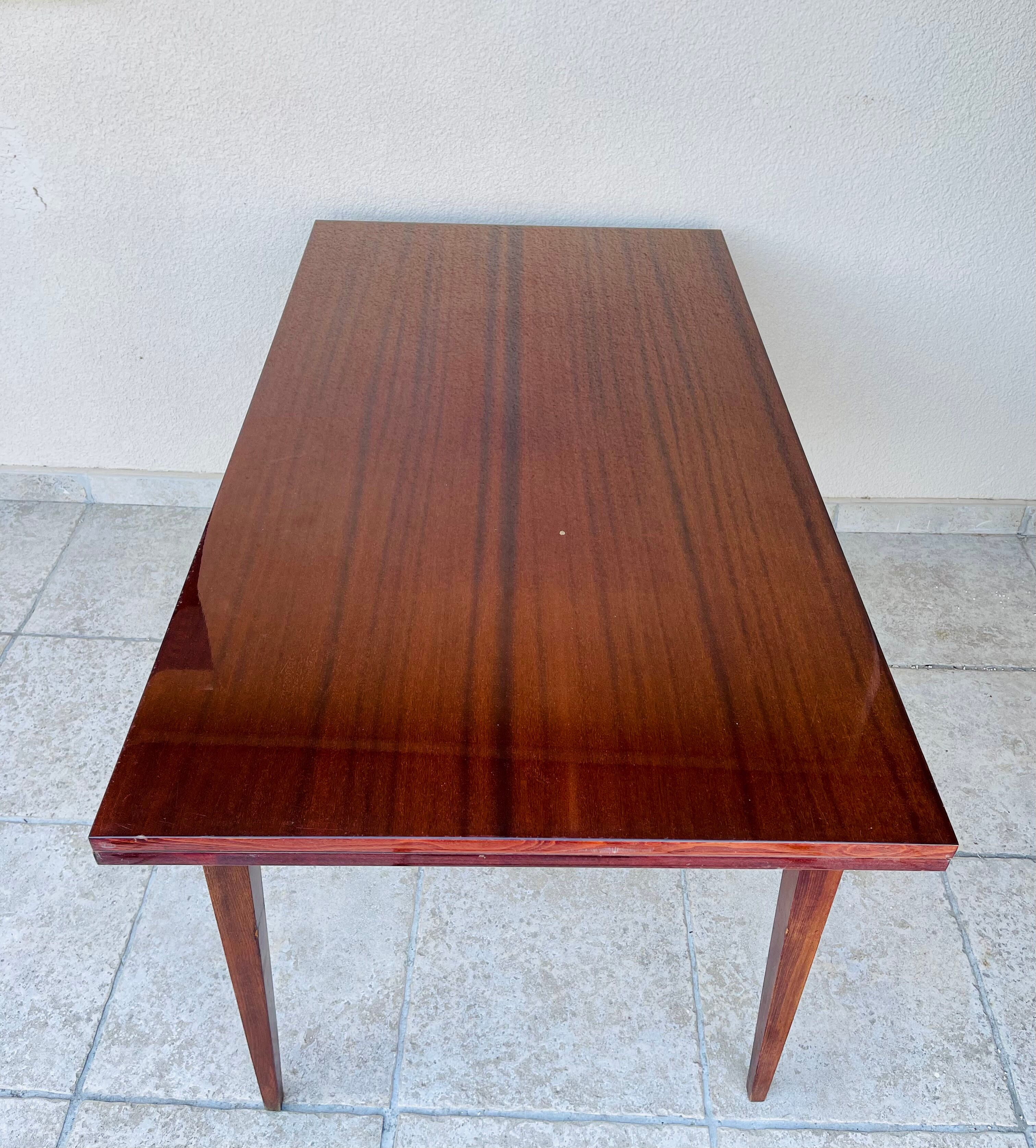 Mahogany dining table with extension cords