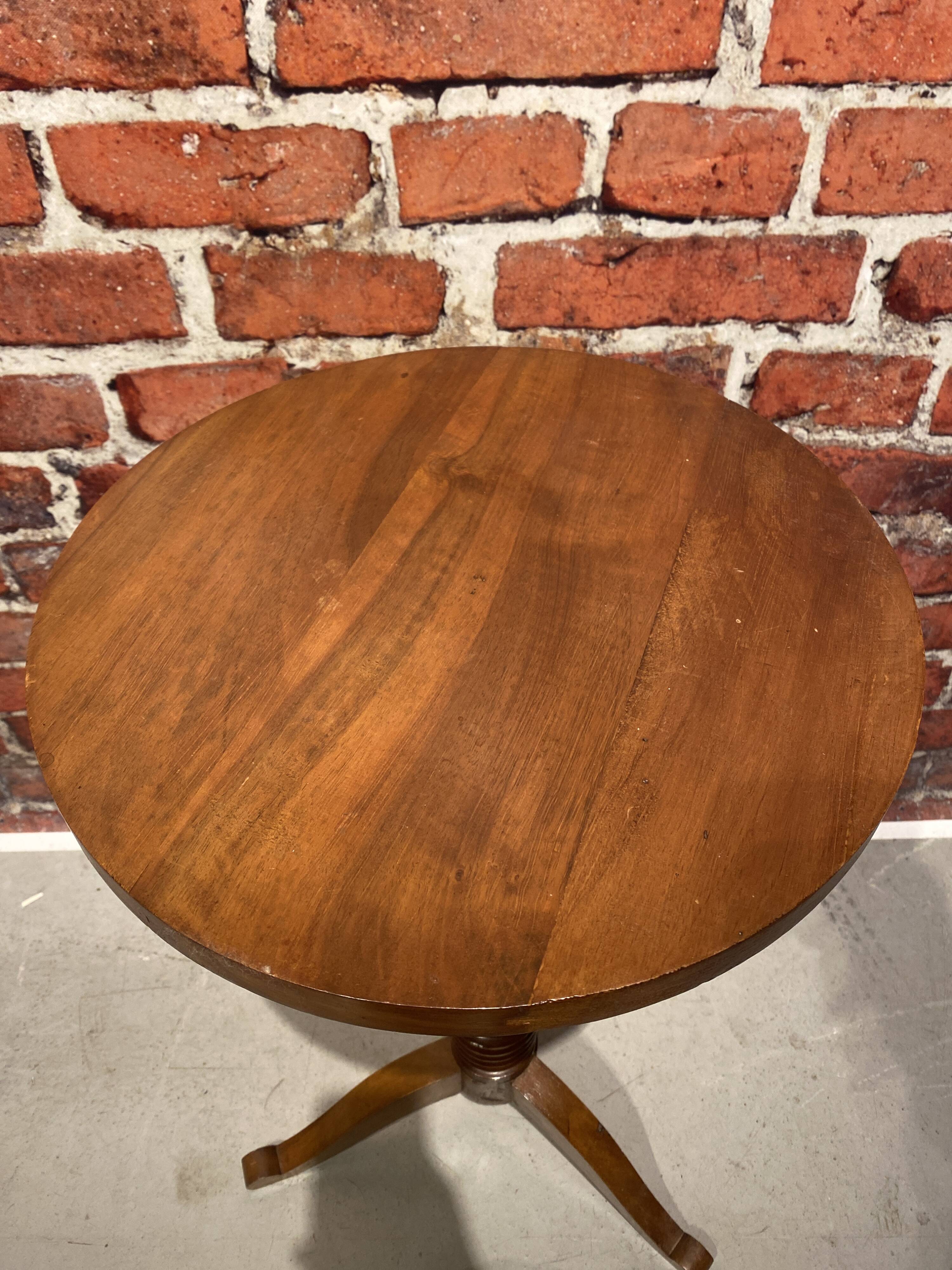 Wooden pedestal table