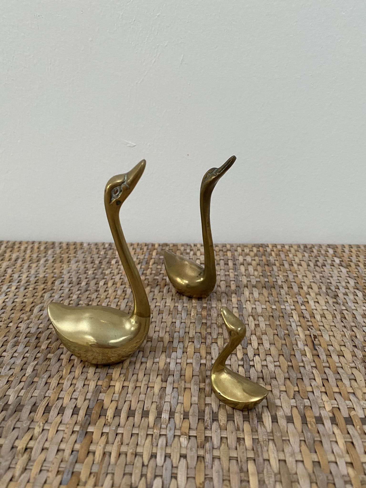 Family of brass swans of the 70s
