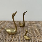 Family of brass swans of the 70s