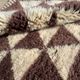 Very large Moroccan Berber rug in cream and burgundy 450x300 cm with a triangular pattern.