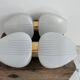 Pair of vintage wall lights from the 60s-70s in striped opaline glass and gilded brass.
