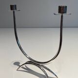 Silver-plated metal and plexiglass design candlestick.