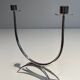 Silver-plated metal and plexiglass design candlestick.